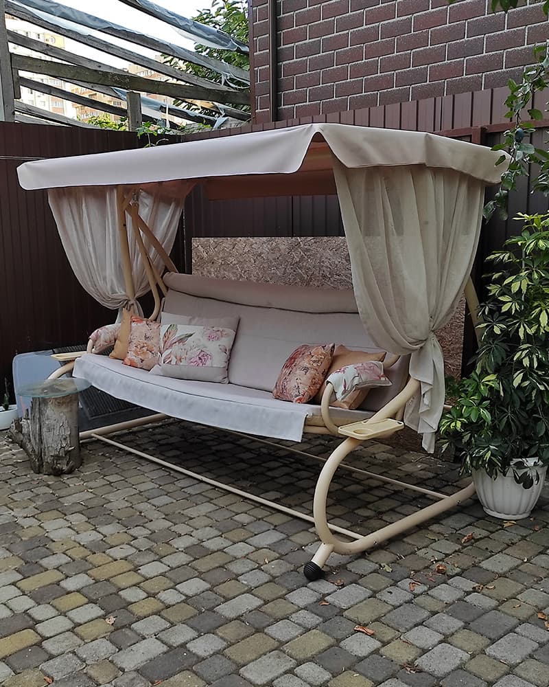 Шторы для уютного уголка на открытом воздухе: выбор и особенности