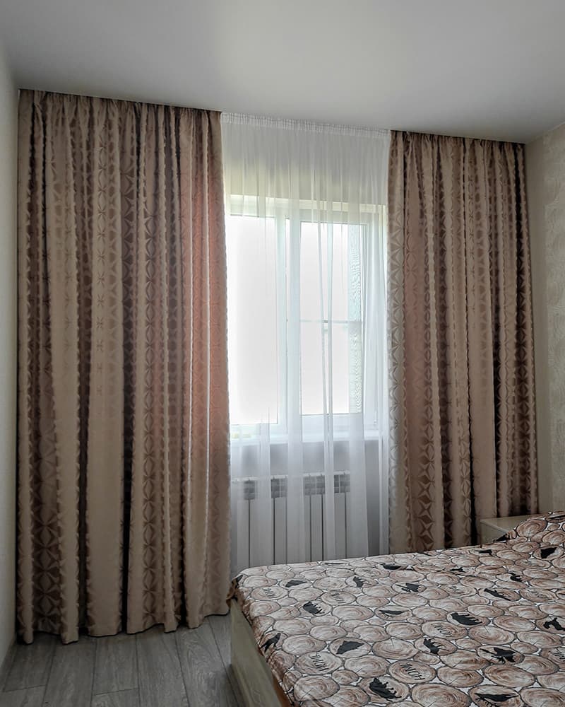 Идеальное сочетание тканевых штор и тюля для элегантного интерьера